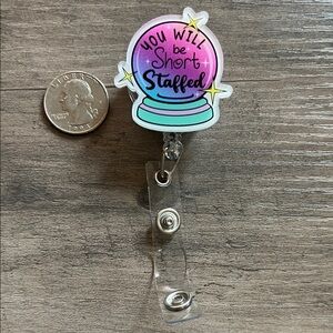 Crystal ball badge reel
